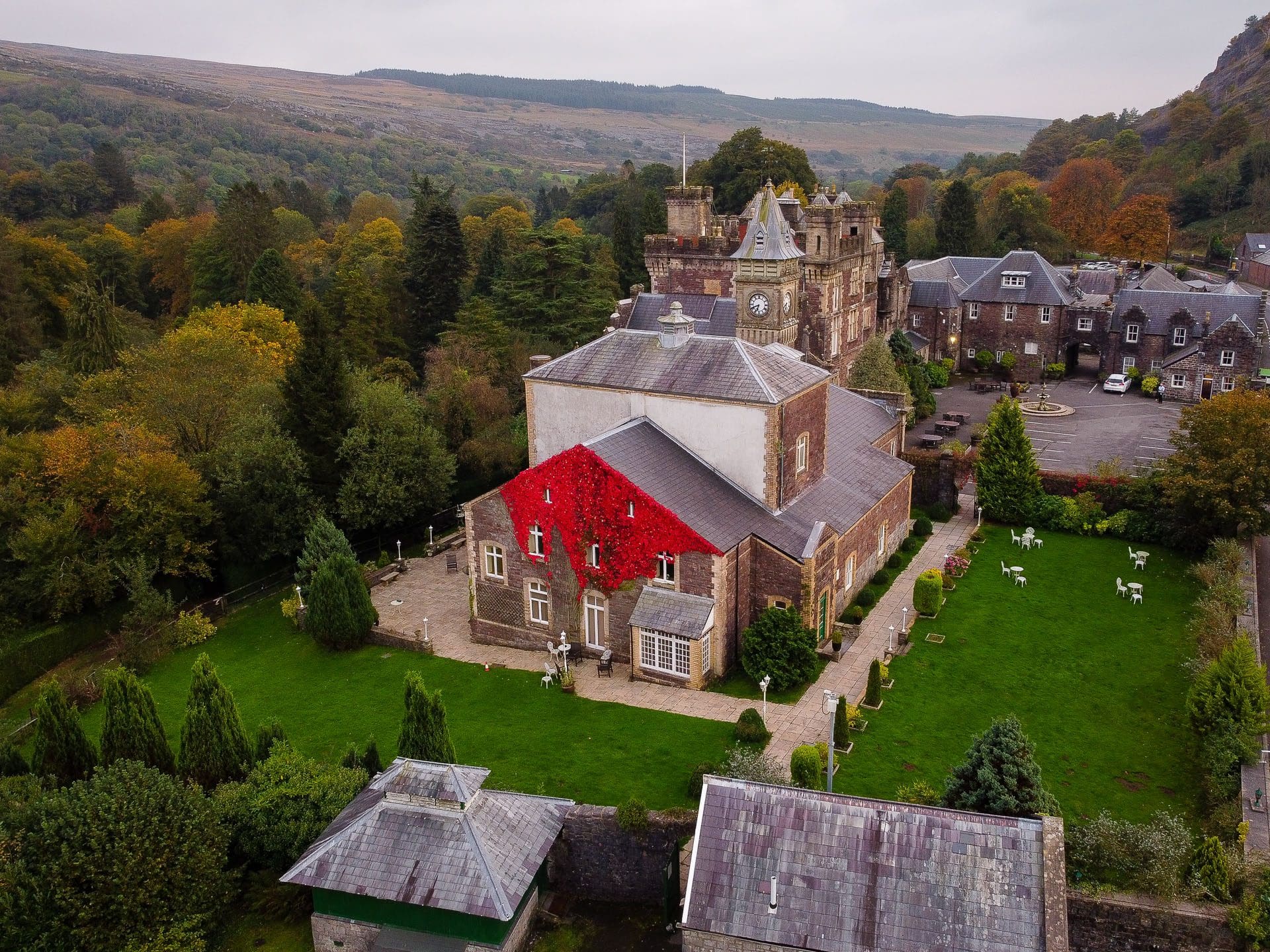 Craig Y Nos Castle Aerial view of front lawn and side from a drone